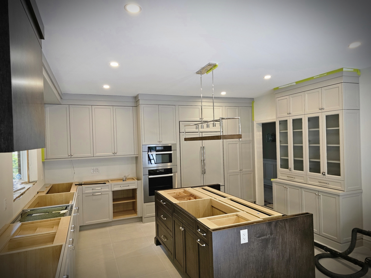 Kitchen Remodel — Cabinetry and island installation